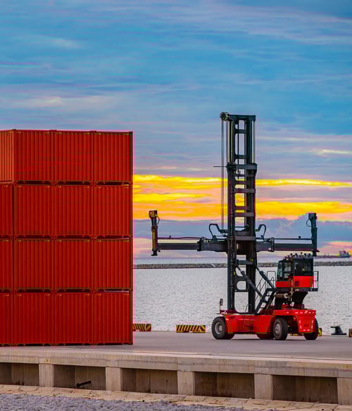 cargo-ship-and-truck-at-seaport-waiting-for-contai-2023-11-27-05-12-43-utc
